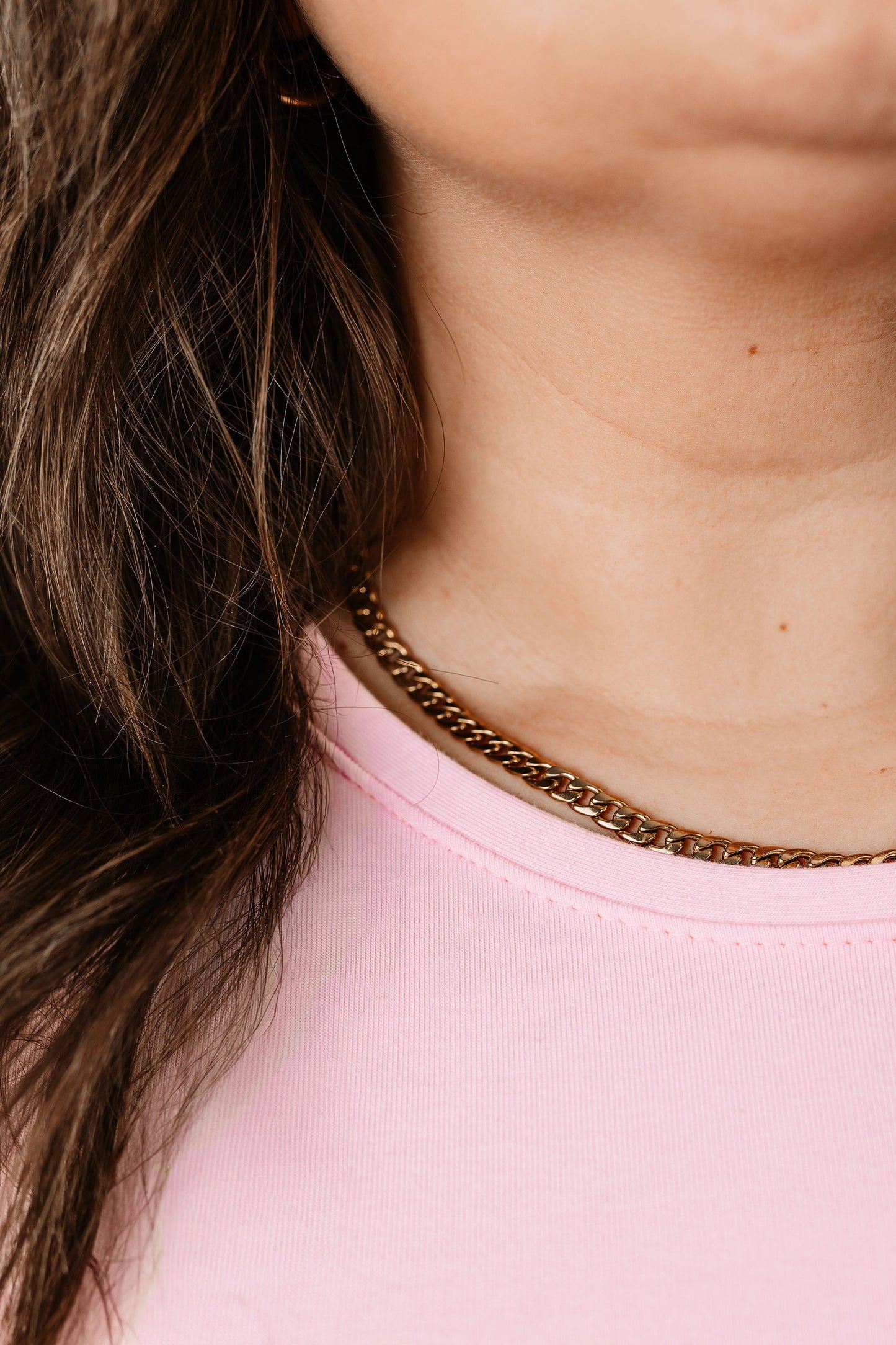 Cara wears the Baby Pink Dallas in size Medium. Close up.